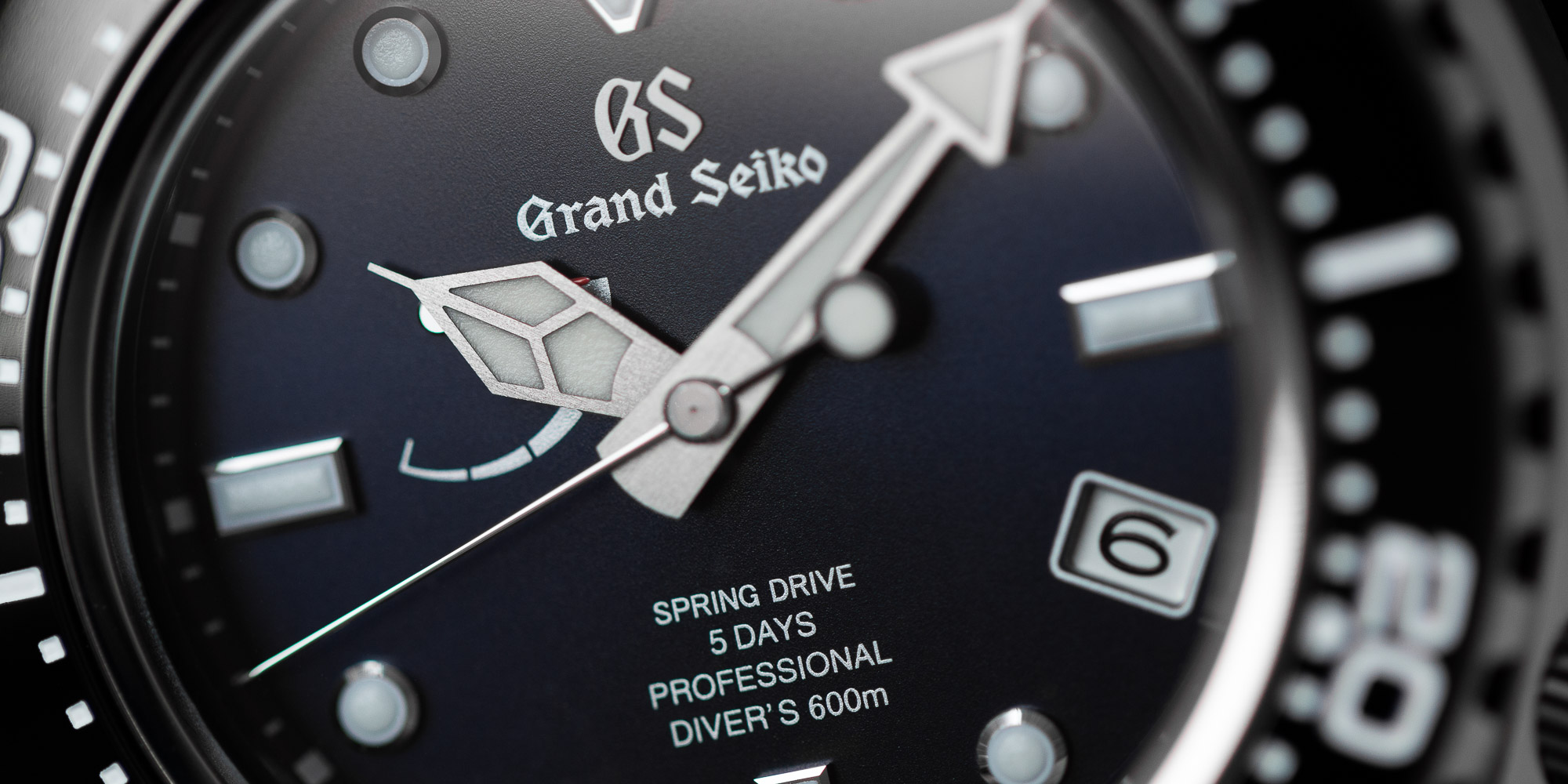 Frozen waterfall Jily Su in winter. Landscape of mountains with Grand_Seiko_Spring_Drive_GMT_SBG295-hero-thumbnail