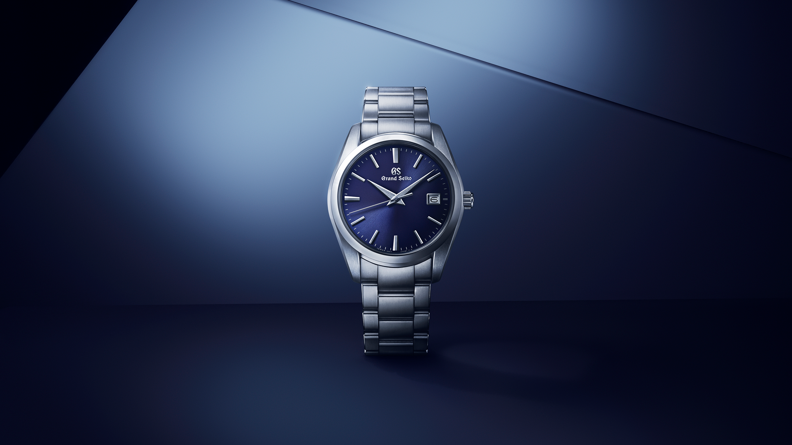 Frozen waterfall Jily Su in winter. Landscape of mountains with Grand_Seiko_Spring_Drive_GMT_SBG295-hero-thumbnail